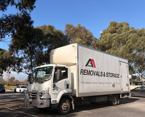 jake_removals_trucks_at_car_park_in_richmond