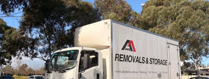 jake_removals_trucks_at_car_park_in_richmond