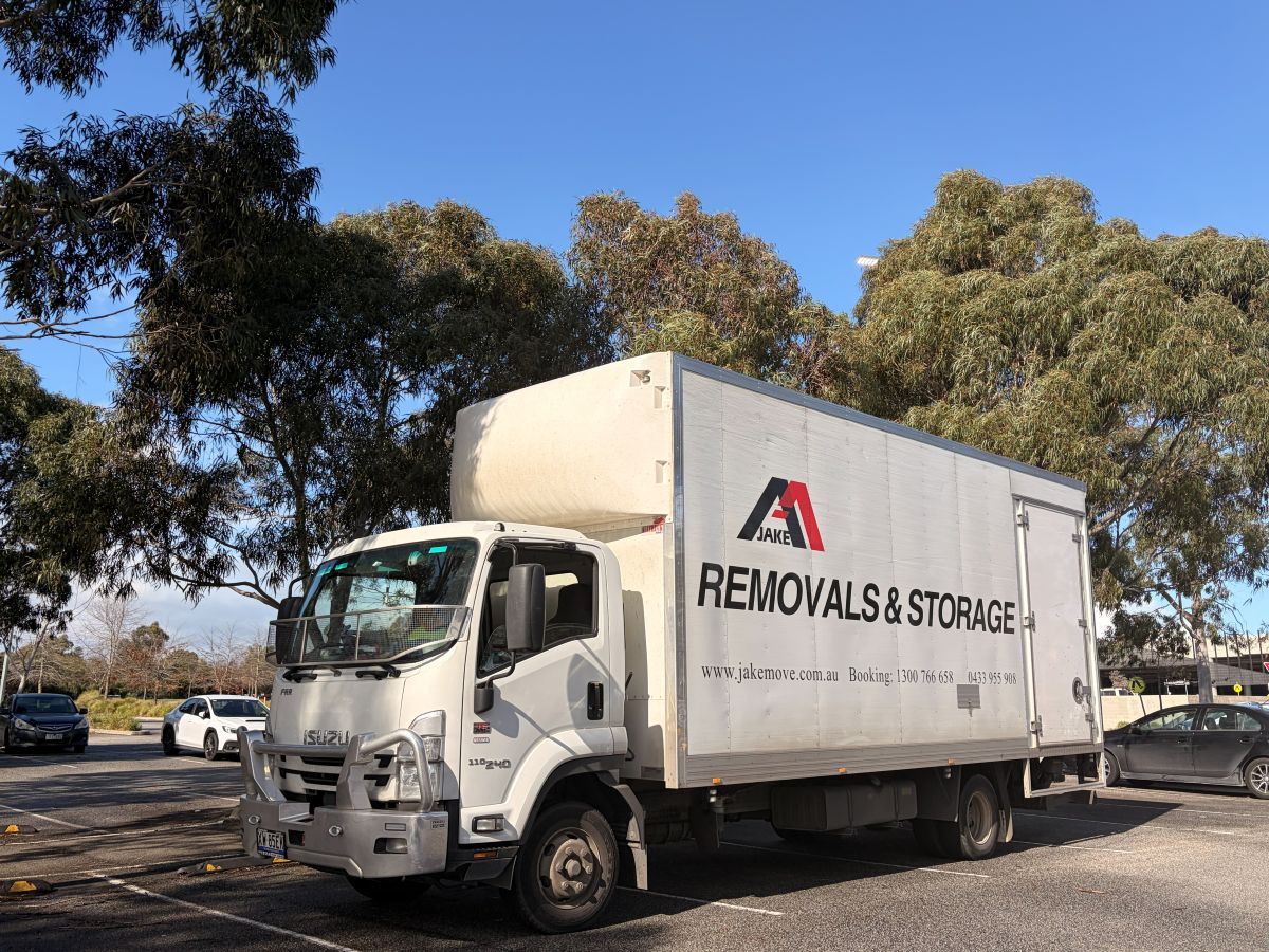 jake_removals_trucks_at_car_park_in_richmond