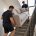 Moving Day Carrying a Sofa Upstairs